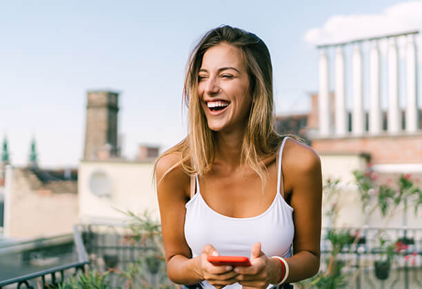 woman on phone laughing