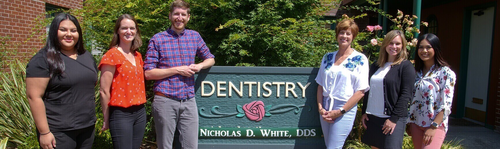 Portland dentist Dr. White and his team