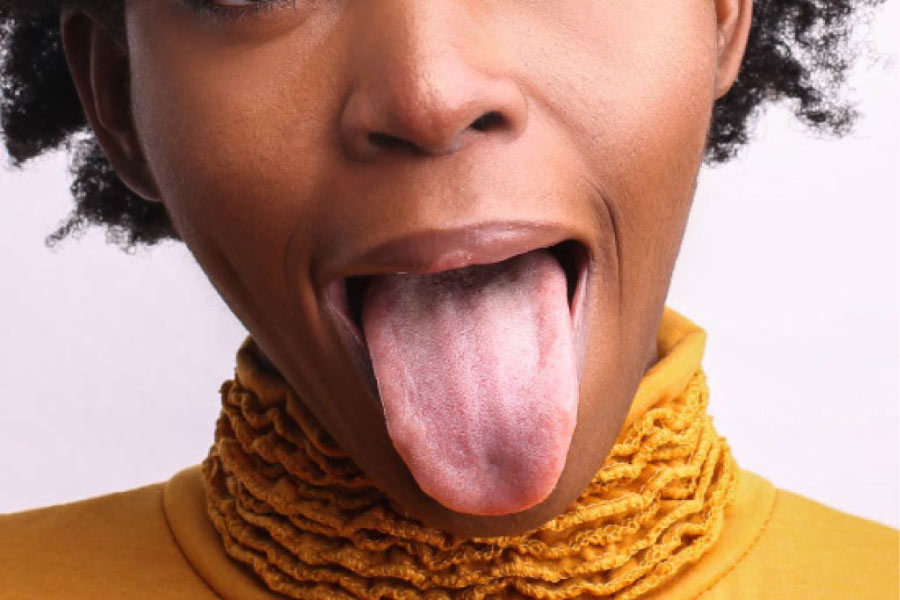 closeup of a woman sticking out her tongue
